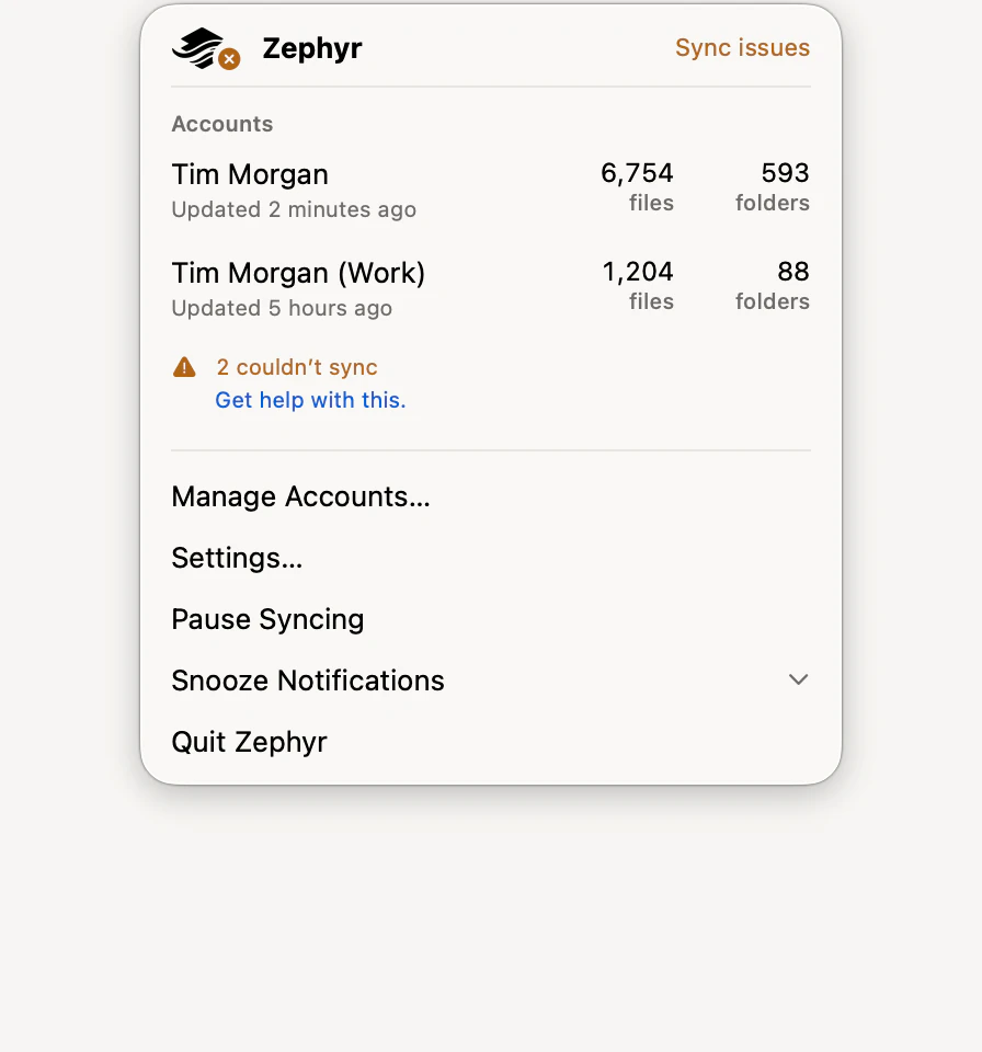 Zephyr’s menu-bar panel, listing two accounts with their file and folder counts and the commands Manage Accounts, Settings, Pause Syncing, Snooze Notifications, and Quit Zephyr.